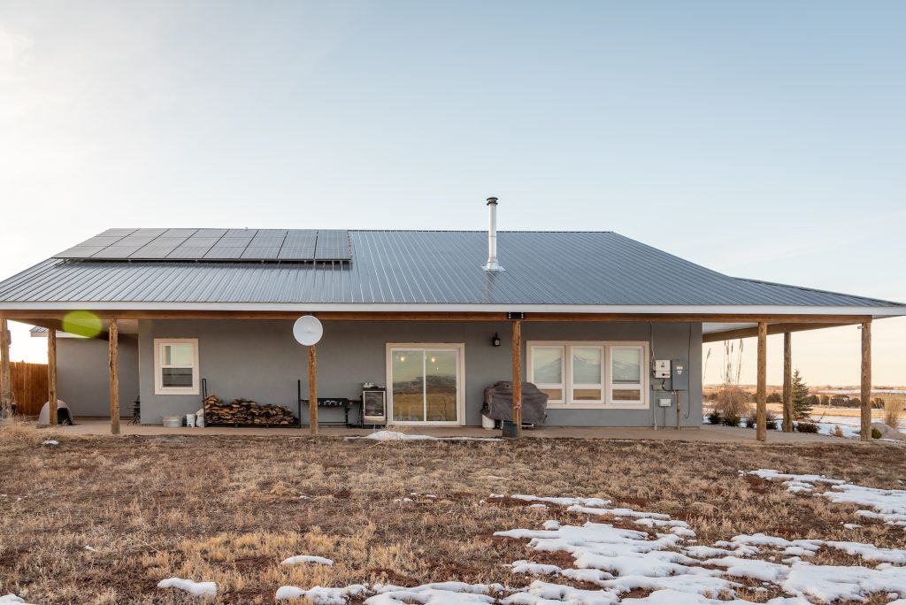 solar panels on large gray house