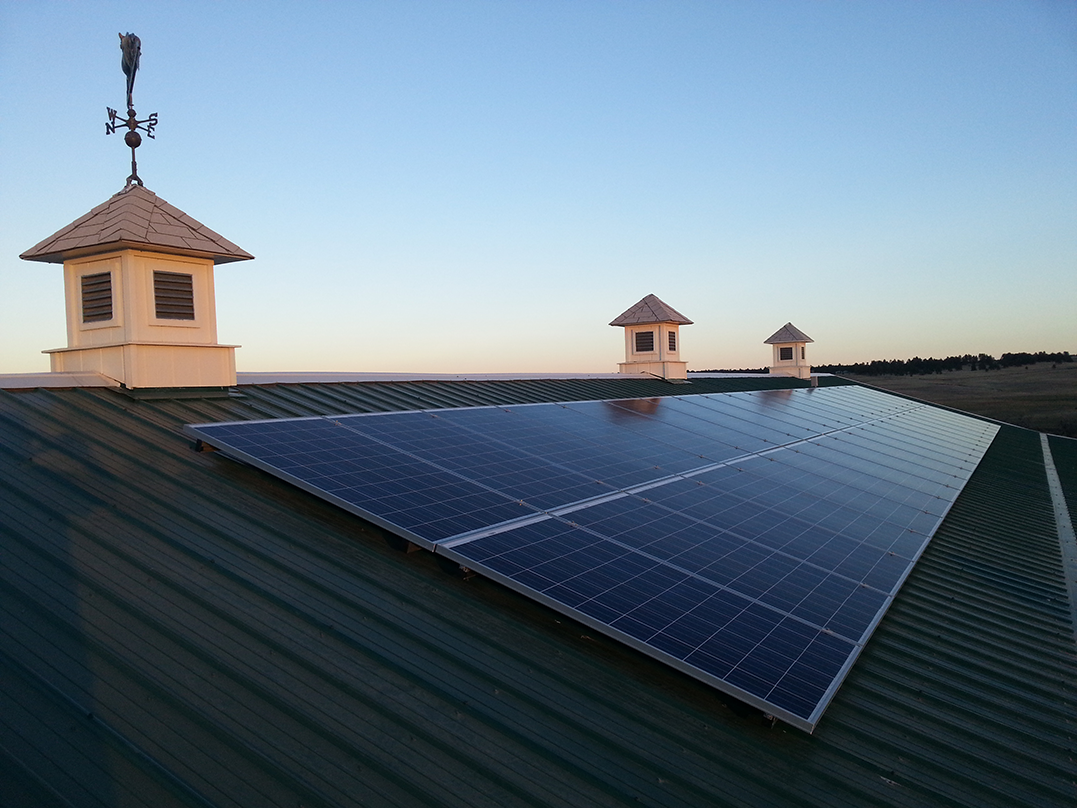 Solar panels installed on rooftop of barn