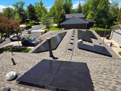 new all black rooftop solar panel installation in colorado