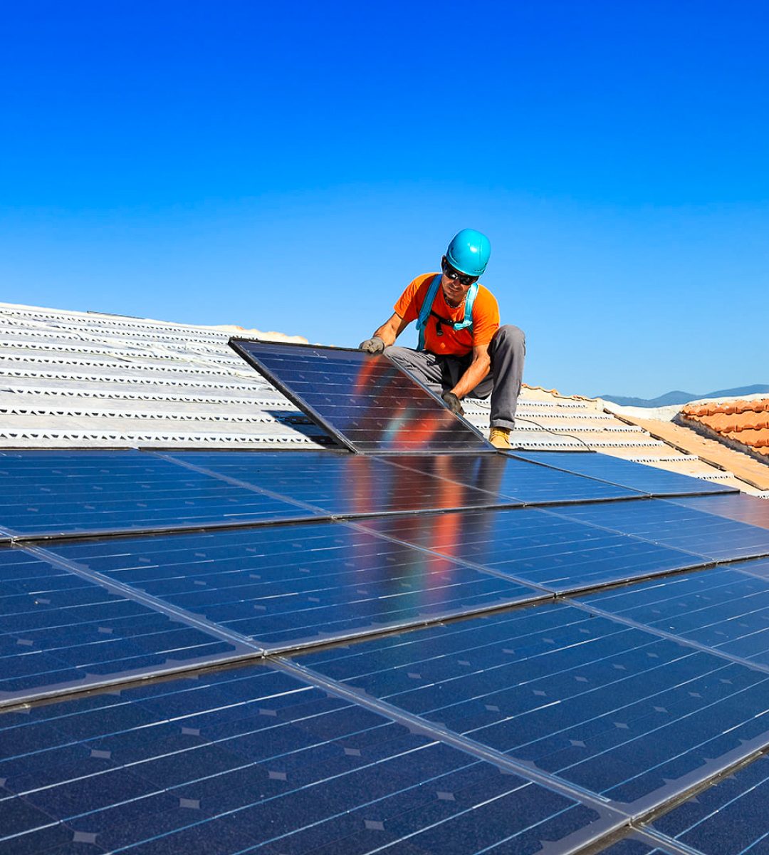 Solar Expert Performing Solar Maintenance Services on Colorado Rooftop